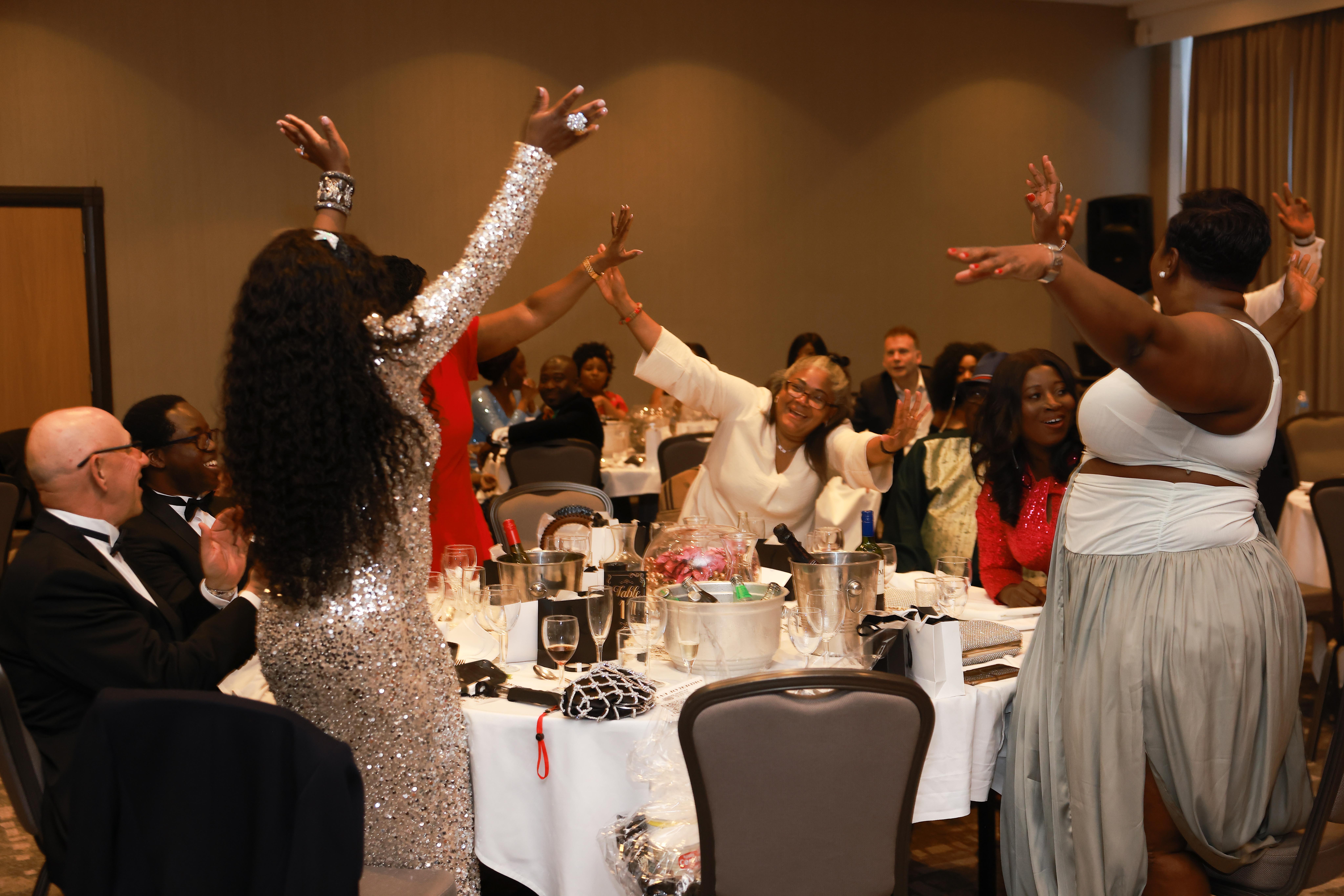 Crowd enjoying the UK Fundraiser celebration